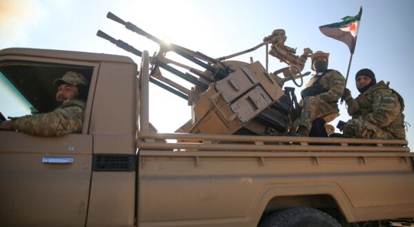 Anti-government fighters ride military vehicles as they drive along a road in the eastern part of Aleppo province on December 1, 2024. Syria's second-largest city Aleppo has fallen from government control for the first time since the country's conflict began more than a decade ago, a war monitor said on December 1, after a surprise advance by rebels.,Image: 941575925, License: Rights-managed, Restrictions: , Model Release: no, Credit line: Aref TAMMAWI / AFP / Profimedia