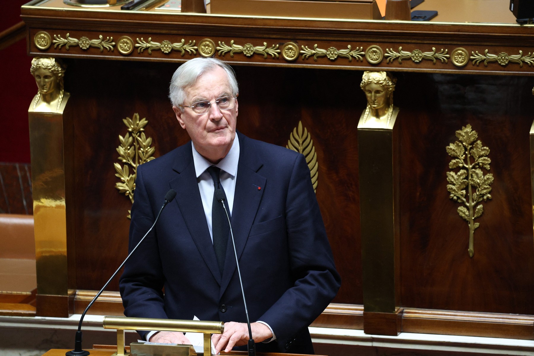 French Prime Minister Michel Barnier delivers a speech during the voting session on the draft of the Social Security bill 2025 at the National Assembly, the French Parliament's lower house, in Paris on December 2, 2024. French Prime Minister faces the biggest risk yet of being deposed by a hostile National Assembly as his government on December 2, 2024, presents a social security financing plan that has the opposition up in arms. These include planned cuts in employer social contributions, a partial end to inflation-indexing of pensions and a less generous prescription drug reimbursement policy.,Image: 942034624, License: Rights-managed, Restrictions: , Model Release: no, Credit line: Lafargue Raphael/ABACA / Abaca Press / Profimedia