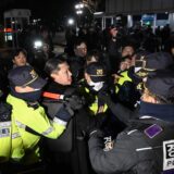 Police attempt to hold back people trying to enter the National Assembly in front of the main gate of the National Assembly in Seoul, South Korea on December 3, 2024, after President Yoon Suk Yeol declared emergency martial law.  South Korea's President Yoon Suk Yeol on December 3 declared emergency martial law, saying the step was necessary to protect the country from "communist forces" amid parliamentary wrangling over a budget bill.,Image: 942460693, License: Rights-managed, Restrictions: , Model Release: no, Credit line: JUNG YEON-JE / AFP / Profimedia