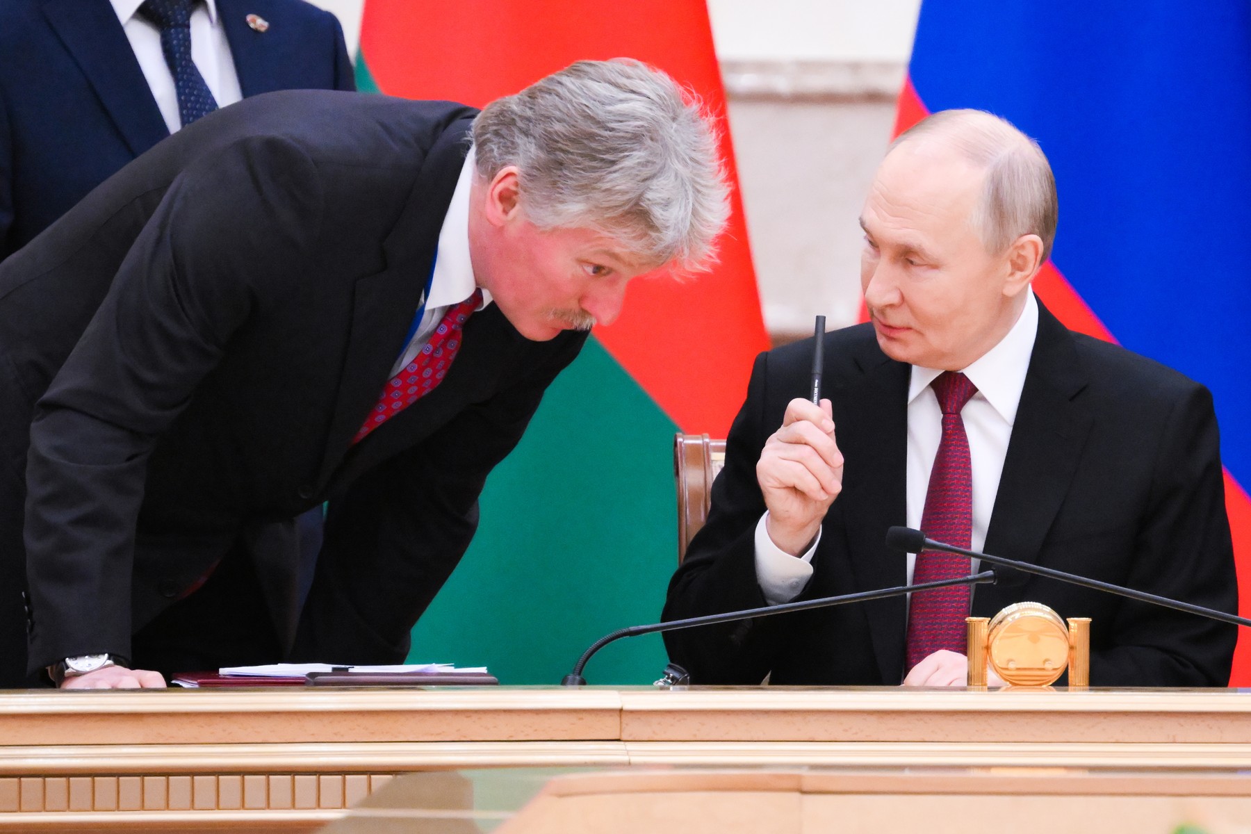 BELARUS, MINSK - DECEMBER 6, 2024: Russia's President Vladimir Putin (R) talks to his Press Secretary Dmitry Peskov during a meeting of the Supreme State Council of the Union State of Russia and Belarus. Grigory Sysoyev/POOL/TASS,Image: 943648675, License: Rights-managed, Restrictions: , Model Release: no, Credit line: Grigory Sysoyev / TASS / Profimedia