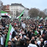 Members of the Syrian community wave Syrian flags as they attend a rally on December 8, 2024 in Berlin, Germany, to celebrate the end of Syrian dictator Bashar al-Assad's rule after rebel fighters took control of the Syrian capital Damascus overnight. Islamist-led rebels toppled Syria's longtime ruler Bashar al-Assad in a lightning offensive that a UN envoy called "a watershed moment" for the nation marred by civil war.,Image: 944384267, License: Rights-managed, Restrictions: , Model Release: no, Credit line: RALF HIRSCHBERGER / AFP / Profimedia