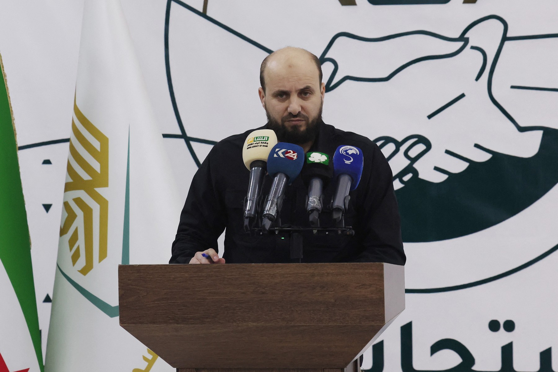 (FILES) Head of Islamist rebel group Hayat Tahrir al-Sham's (HTS) 'Salvation Government' in their northwest Syria bastion Mohammed Bashir, holds a press conference in the rebel-held northwestern Syrian city of Idlib on November 28, 2024. Bashir's name has been circulating as the most likely candidate for prime minister in the transitional administration, after Islamist-led rebels on December 8, 2024, ousted president Bashar al-Assad in a lightning offensive that saw them sweep swathes of territory from government control.,Image: 944816159, License: Rights-managed, Restrictions: , Model Release: no, Credit line: Omar HAJ KADOUR / AFP / Profimedia