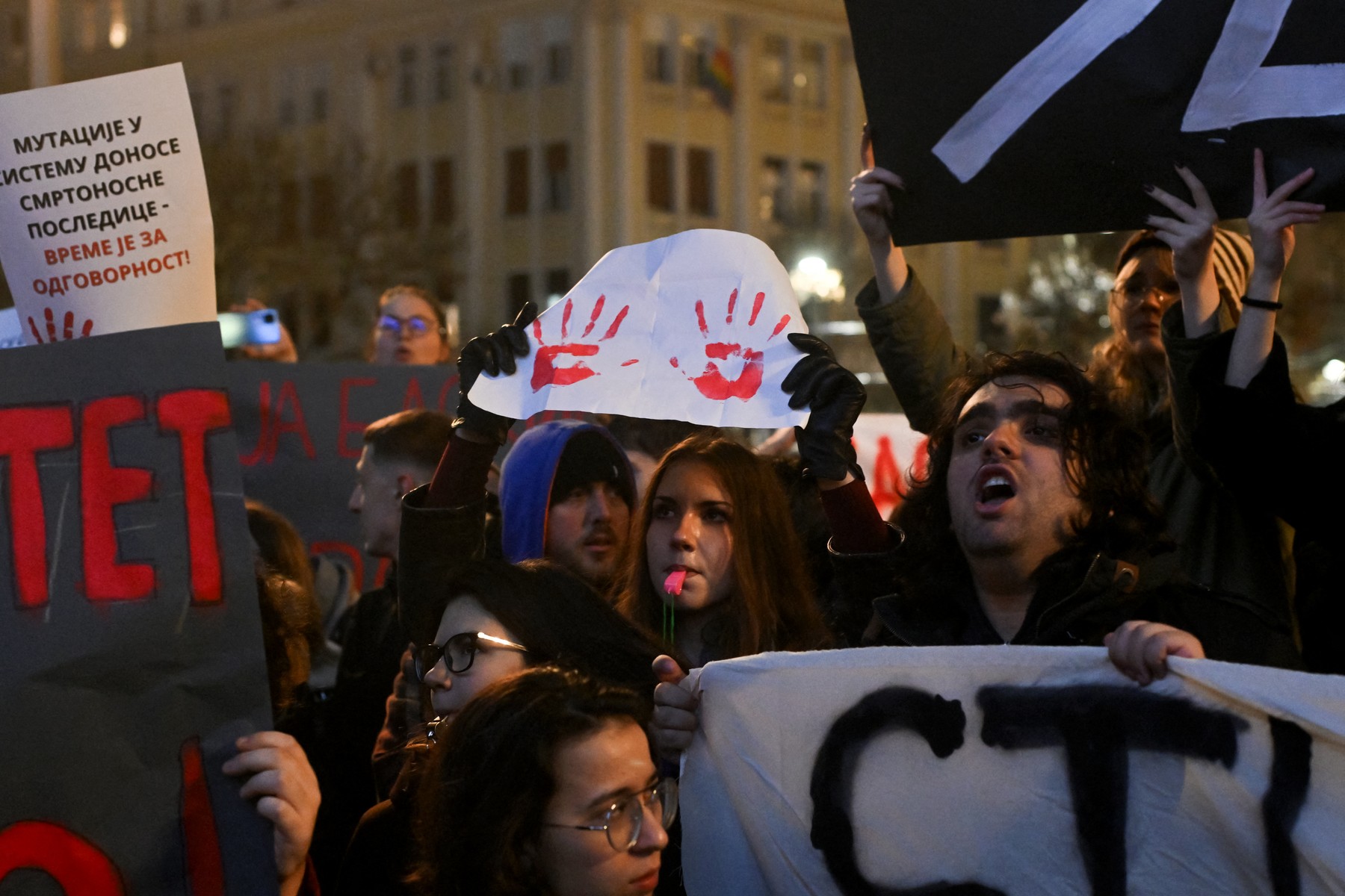 Hundreds of students gather in protest outside the Serbian presidency building in Belgrade on December 11, 2024, demanding accountability for the tragedy at the railway station in Novi Sad, and blaming the deaths on corruption and poor oversight of construction projects. Serbian President Aleksandar Vucic pledged on December 11, 2024 to publish all documents relating to works on a train station in the city of Novi Sad where a roof collapse killed 15 people last month, agreeing to an opposition demand.,Image: 945587385, License: Rights-managed, Restrictions: , Model Release: no, Credit line: OLIVER BUNIC / AFP / Profimedia