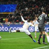 AC Milan's English forward #90 Tammy Abraham scores his team's second goal during the UEFA Champions League football match between AC Milan and Red Star Belgrade (Crvena zvezda) at San Siro stadium in Milan, on December 11, 2024.,Image: 945644685, License: Rights-managed, Restrictions: , Model Release: no, Credit line: Alberto PIZZOLI / AFP / Profimedia