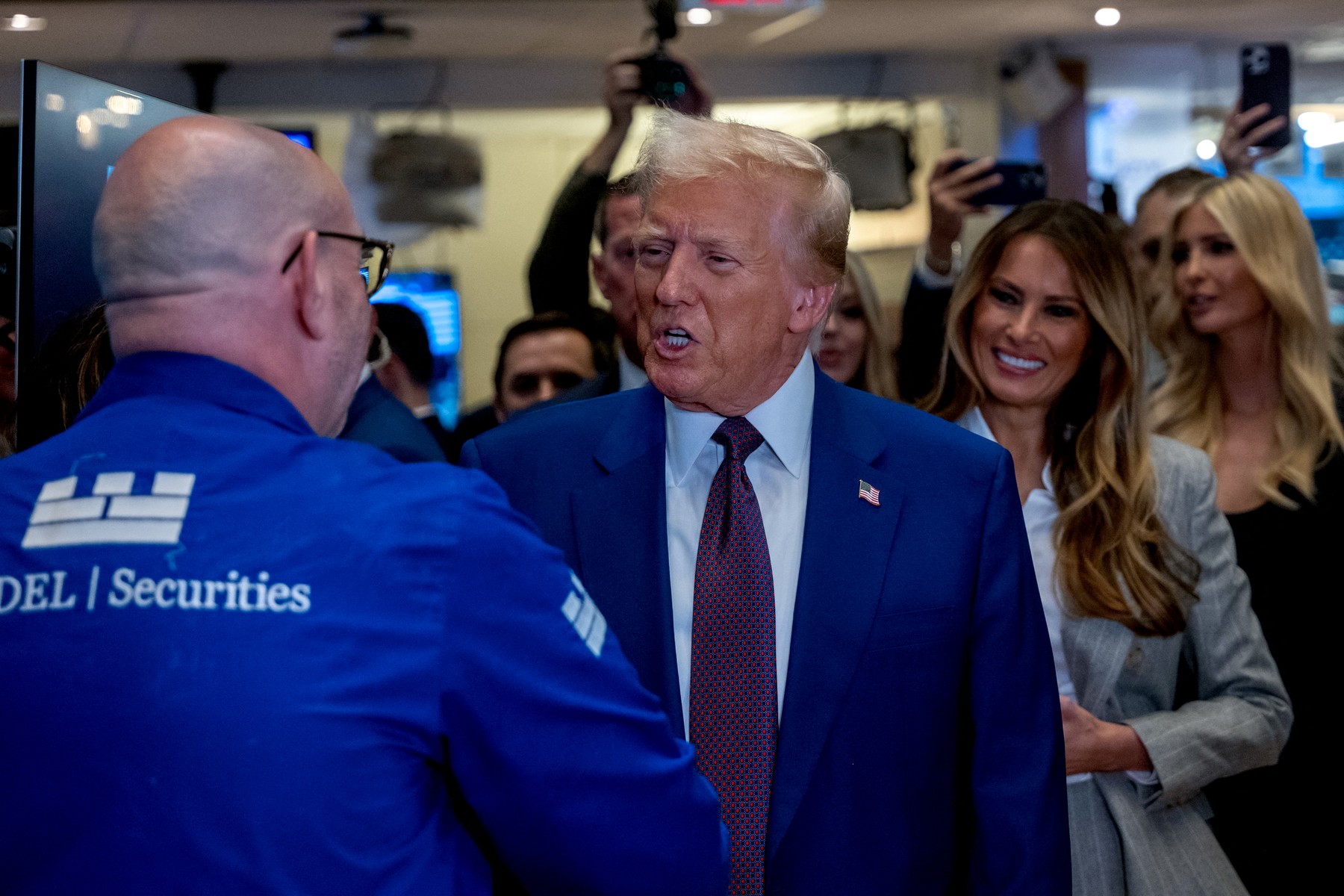 NEW YORK, NEW YORK - DECEMBER 12: President-elect Donald Trump walks onto the floor of the New York Stock Exchange (NYSE) with his wife Melania, after being named TIME’s “Person of the Year” for the second time on December 12, 2024 in New York City. Trump attended a reception and rang the opening bell on the trading floor.   Spencer Platt,Image: 945938229, License: Rights-managed, Restrictions: , Model Release: no, Credit line: SPENCER PLATT / Getty images / Profimedia