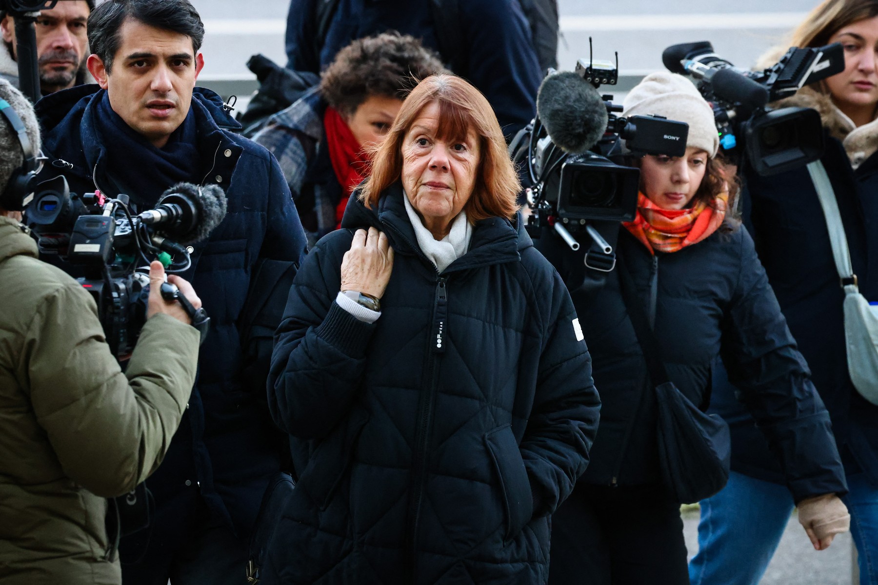 Gisele Pelicot and one of her lawyers Stephane Babonneau (L) arrive at the Avignon courthouse for the last day of the defense's final pleas, at the trial of her former partner Dominique Pelicot accused of drugging her for nearly ten years and inviting strangers to rape her at their home in Mazan, a small town in the south of France, in Avignon, on December 16, 2024. In a trial that has shocked the country and whose verdict is expected this week, Dominique Pelicot, 72, has admitted to drugging his then wife Gisele Pelicot for almost a decade so he and strangers he recruited online could rape her.,Image: 947277722, License: Rights-managed, Restrictions: , Model Release: no, Credit line: CLEMENT MAHOUDEAU / AFP / Profimedia