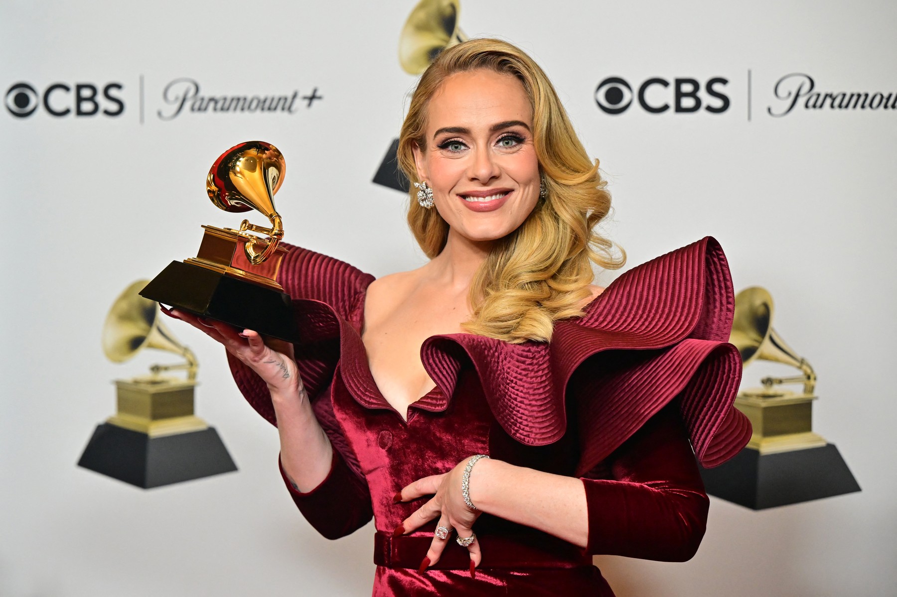 (FILES) English singer-songwriter Adele poses with the award for Best Pop Solo Performance for "Easy on Me" in the press room during the 65th Annual Grammy Awards at the Crypto.com Arena in Los Angeles on February 5, 2023. A Brazilian judge has ordered a song by British pop superstar Adele, "Million Years Ago", be pulled globally -- including on streaming services -- over an ongoing plagiarism claim by a Brazilian composer.,Image: 947511836, License: Rights-managed, Restrictions: , Model Release: no, Credit line: Frederic J. Brown / AFP / Profimedia