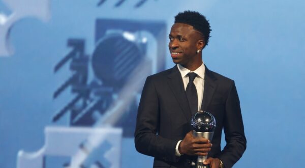 Brazilian forward Vinicius Junior poses with the Best Player trophy during the Best FIFA Football Awards 2024 ceremony in Doha on December 17, 2024.,Image: 947830695, License: Rights-managed, Restrictions: , Model Release: no, Credit line: Karim JAAFAR / AFP / Profimedia