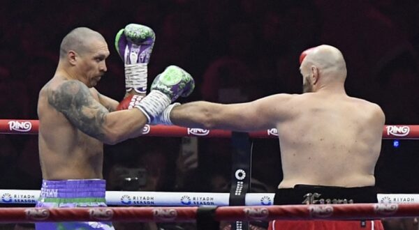 RIYADH, SAUDI ARABIA - DECEMBER 22: Oleksandr Usyk of Ukraine in action against Tyson Fury of United Kingdom during â€œRiyadh Seasonâ€ boxing match event at the Kingdom Arena in Riyadh, Saudi Arabia on December 22, 2024. Mohammed Saad / Anadolu,Image: 949217587, License: Rights-managed, Restrictions: , Model Release: no, Credit line: Mohammed Saad / AFP / Profimedia