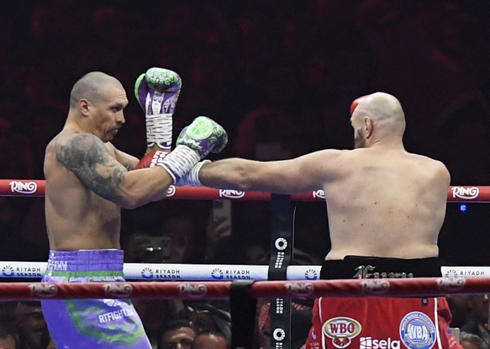 RIYADH, SAUDI ARABIA - DECEMBER 22: Oleksandr Usyk of Ukraine in action against Tyson Fury of United Kingdom during â€œRiyadh Seasonâ€ boxing match event at the Kingdom Arena in Riyadh, Saudi Arabia on December 22, 2024. Mohammed Saad / Anadolu,Image: 949217587, License: Rights-managed, Restrictions: , Model Release: no, Credit line: Mohammed Saad / AFP / Profimedia