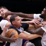 PHOENIX, ARIZONA - DECEMBER 27: Naji Marshall #13 of the Dallas Mavericks punches Jusuf Nurkic #20 of the Phoenix Suns during the second half at Footprint Center on December 27, 2024 in Phoenix, Arizona.,Image: 950508339, License: Rights-managed, Restrictions: , Model Release: no, Credit line: Chris Coduto / Getty images / Profimedia