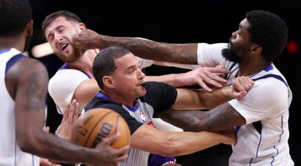 PHOENIX, ARIZONA - DECEMBER 27: Naji Marshall #13 of the Dallas Mavericks punches Jusuf Nurkic #20 of the Phoenix Suns during the second half at Footprint Center on December 27, 2024 in Phoenix, Arizona.,Image: 950508339, License: Rights-managed, Restrictions: , Model Release: no, Credit line: Chris Coduto / Getty images / Profimedia