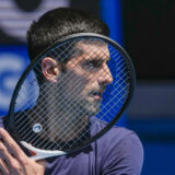 Defending men's champion Serbia's Novak Djokovic practices on Rod Laver Arena ahead of the Australian Open tennis championship in Melbourne, Australia, Wednesday, Jan. 12, 2022. AP Photo/Mark Baker)