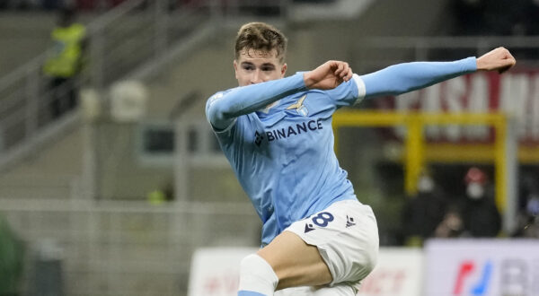 Lazio's Toma Basic controls the ball during an Italian Cup soccer match between AC Milan and Lazio at the San Siro stadium, in Milan, Italy, Wednesday, Feb. 9, 2022. (AP Photo/Antonio Calanni)