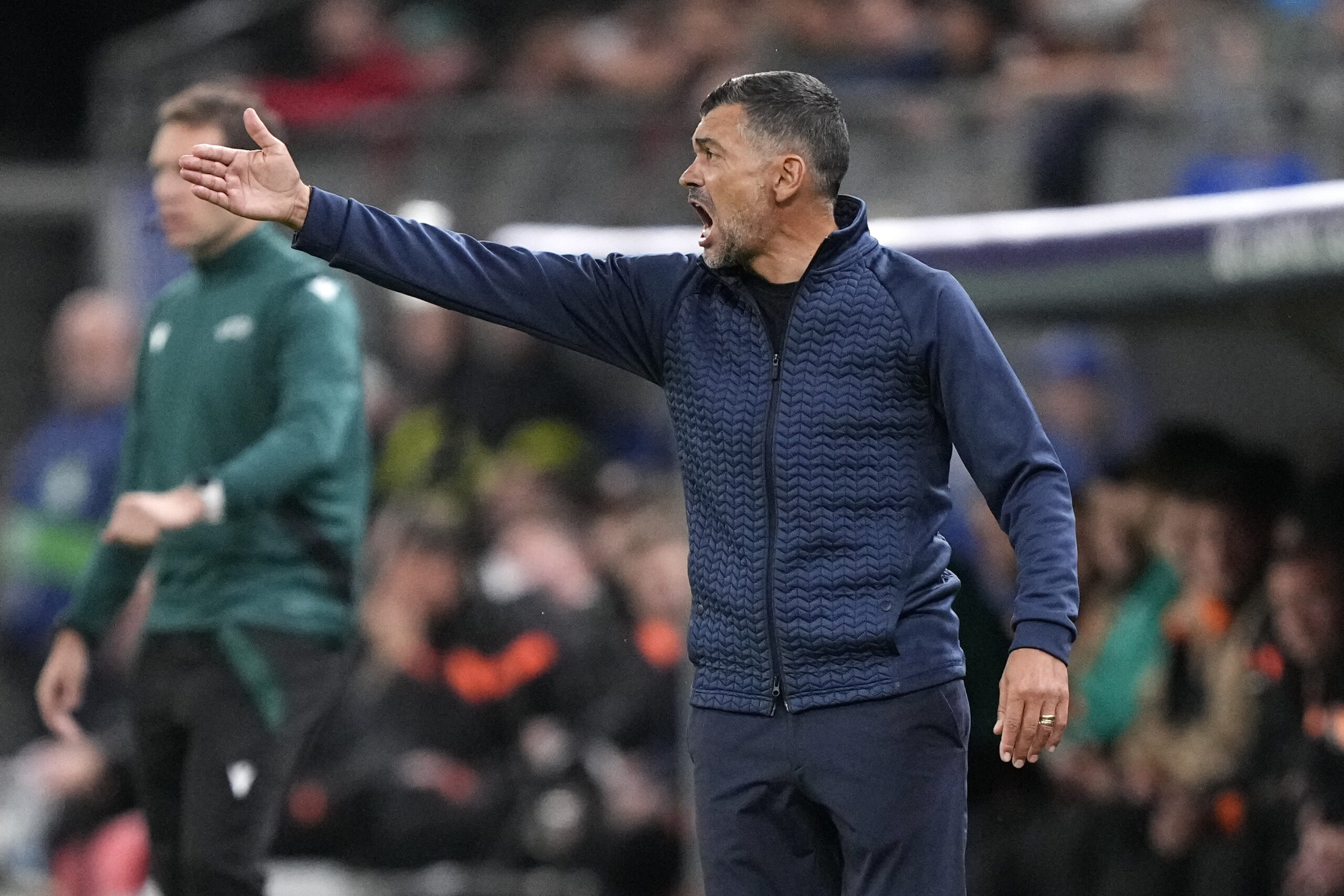 Porto's head coach Sergio Conceicao reacts during the UEFA Champions League Group H soccer match between Shakhtar Donetsk and FC Porto in Hamburg, Germany, Tuesday, Sept. 19, 2023. (AP Photo/Martin Meissner)