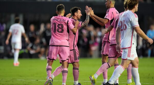 Inter Miami forward Lionel Messi, second from left, celebrates his goal against St. Louis City with defender Jordi Alba (18) and midfielder Sergio Busquets during the first half of an MLS soccer match Saturday, June 1, 2024, in Fort Lauderdale, Fla. (AP Photo/Rebecca Blackwell) MLS St Louis Inter Miami Soccer