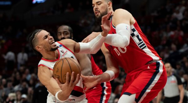 Portland Trail Blazers forward Toumani Camara, left, tries to get around Los Angeles Clippers center Ivica Zubac (40) as he goes to the basket during the first half of an NBA basketball game, Thursday, Jan. 16, 2025, in Portland, Ore. (AP Photo/Jenny Kane) Clippers Trail Blazers Basketball