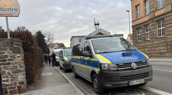 Police cars stand near the site of a stabbing in Aschaffenburg on January 22, 2025.  A 41-year-old man and a two-year-old boy were killed and two other people severely injured in a knife attack in the German city of Aschaffenburg on Wednesday, police said.,Image: 956434789, License: Rights-managed, Restrictions: , Model Release: no, Credit line: Pascal HOEFIG / AFP / Profimedia