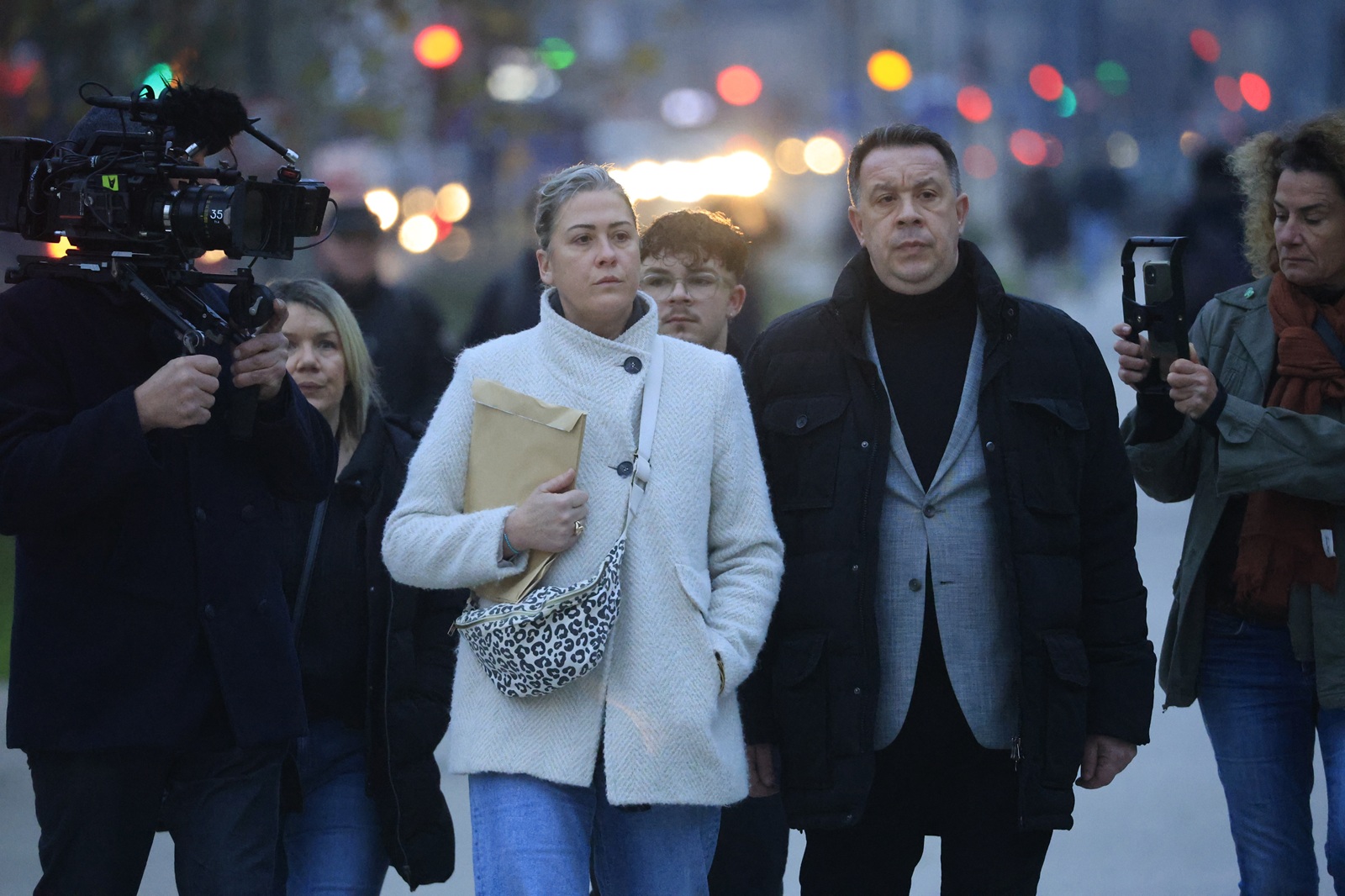 epa11784820 Caroline Darian (L), daughter of Gisele Pelicot, and her brother David (R) arrive at the criminal court where her father Dominique Pelicot is on trial in Avignon, South of France, 19 December 2024. Judges will hand down verdicts on 51 men in the mass rape trial in which Dominique Pelicot is accused of drugging and raping his then-wife, Gisele Pelicot, as well as inviting dozens of men to rape her while she was unconscious at their home in Mazan, France, between 2011 and 2020.  EPA/GUILLAUME HORCAJUELO