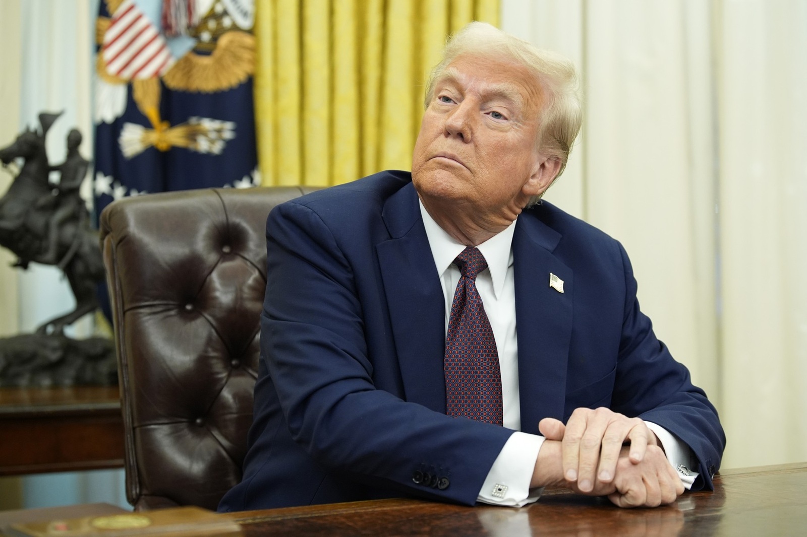 United States President Donald Trump sits in the Oval Office of the White House in Washington, DC after signing executive orders on January 23, 2025.,Image: 957139690, License: Rights-managed, Restrictions: **Not for sale in: USA, Brazil, Mexico,**, Model Release: no, Credit line: RS/MPI / Capital pictures / Profimedia