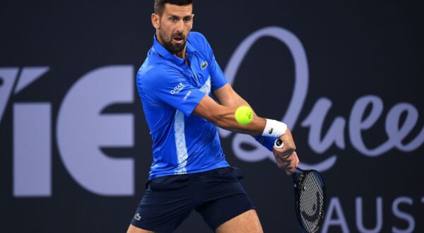 epa11799684 Novak Djokovic of Serbia in action against Rinky Hijikata of Australia during their Brisbane International tennis tournament match at Queensland Tennis Centre in Brisbane, Australia, 31 December 2024.  EPA/JONO SEARLE  AUSTRALIA AND NEW ZEALAND OUT