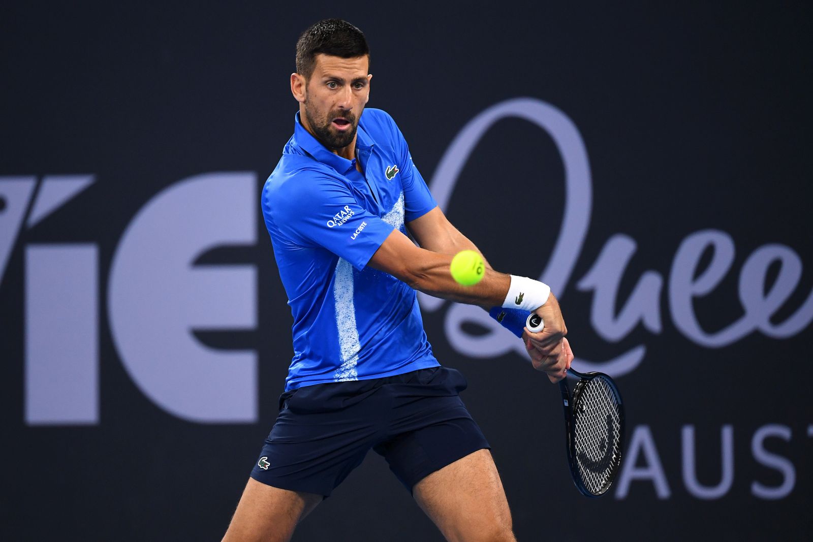 epa11799684 Novak Djokovic of Serbia in action against Rinky Hijikata of Australia during their Brisbane International tennis tournament match at Queensland Tennis Centre in Brisbane, Australia, 31 December 2024.  EPA/JONO SEARLE  AUSTRALIA AND NEW ZEALAND OUT