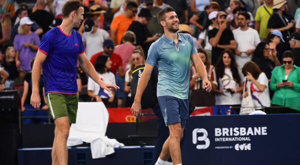 epa11800834 Michael Venus (R) of New Zealand and Nikola Mektic (L) of Croatia react after winning their doubles match against Novak Djokovic of Serbia and Nick Kyrgios of Australia at the Brisbane International tennis tournament in Queensland Tennis Centre in Brisbane, Australia, 01 January 2025.  EPA/JONO SEARLE AUSTRALIA AND NEW ZEALAND OUT