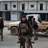 epa11805847 Syrian opposition fighters secure the area near Manbij city, northern Syria, 04 January 2025. A group of opposition fighters from the National Army gathered near Manbij to launch a military operation against the positions of the Syrian Democratic Forces (SDF) in Tishreen Dam near the city of Manbij in northern Syria.  EPA/BILAL AL HAMMOUD