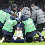 epa11813656 Rodrigo Bentancur of Tottenham is carried off the pitch on a stretcher during the EFL Cup semi-finals match between Tottenham Hotspur and Liverpool FC, in London, Britain, 08 January 2025.  EPA/NEIL HALL