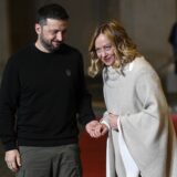 epa11815573 Italian Prime Minister Giorgia Meloni (R) welcomes Ukrainian President Volodymyr Zelensky (L) ahead of their talks at Palazzo Chigi, Rome, Italy, 09 January 2025.   EPA/RICCARDO ANTIMIANI