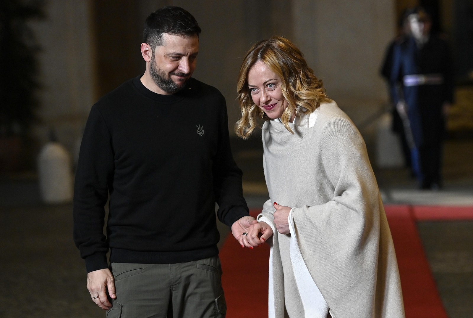 epa11815573 Italian Prime Minister Giorgia Meloni (R) welcomes Ukrainian President Volodymyr Zelensky (L) ahead of their talks at Palazzo Chigi, Rome, Italy, 09 January 2025.   EPA/RICCARDO ANTIMIANI