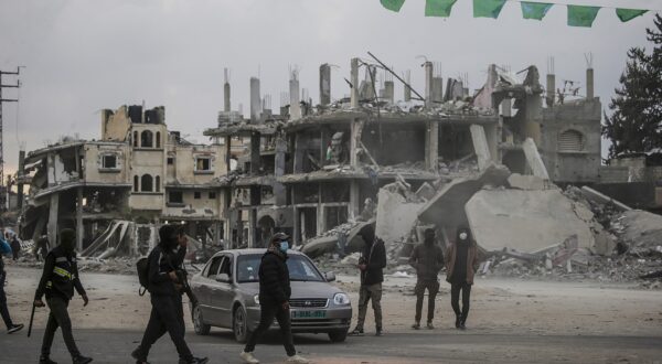 epa11845042 Hamas security men patrol the streets as humanitarian aid trucks cross into Rafah amid a ceasefire between Israel and Hamas, in the east of Rafah, southern Gaza Strip, 22 January 2025. According to the UN, hundreds of humanitarian aid trucks have entered the Gaza Strip since Israel and Hamas implemented the first phase of a hostage release and ceasefire deal on 19 January 2025.  EPA/MOHAMMED SABER