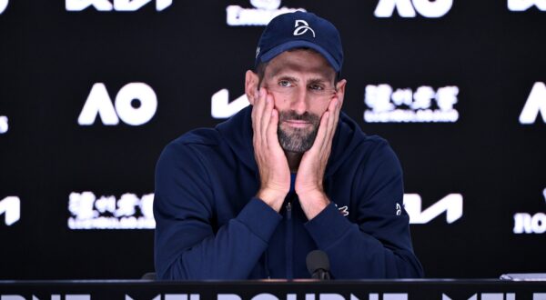 epa11848995 Novak Djokovic of Serbia talks to the media after retiring from his semifinal match against Alexander Zverev of Germany during the Australian Open at Melbourne Park in Melbourne, Australia 24 January 2025.  EPA/JAMES ROSS AUSTRALIA AND NEW ZEALAND OUT