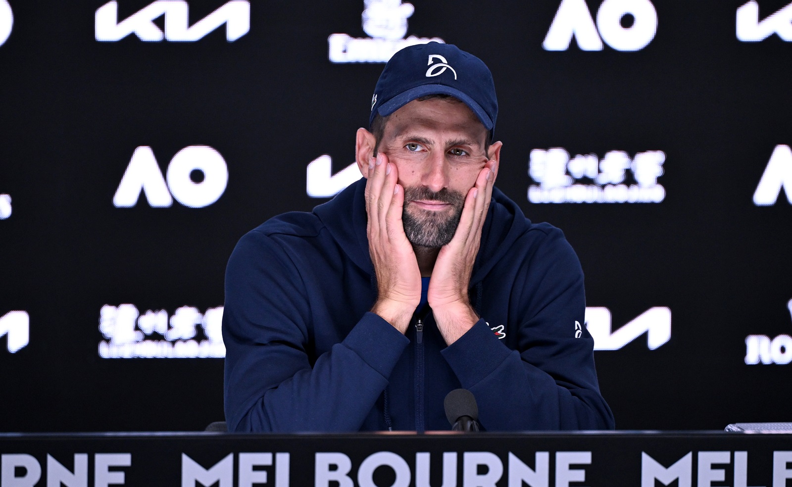 epa11848995 Novak Djokovic of Serbia talks to the media after retiring from his semifinal match against Alexander Zverev of Germany during the Australian Open at Melbourne Park in Melbourne, Australia 24 January 2025.  EPA/JAMES ROSS AUSTRALIA AND NEW ZEALAND OUT