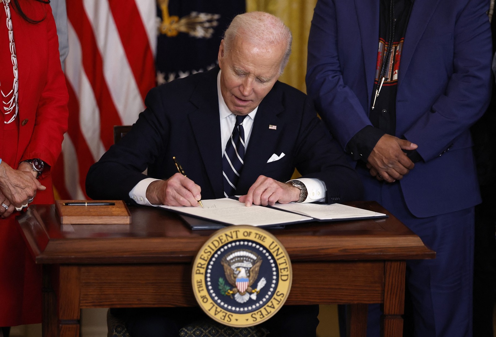 WASHINGTON, DC - JANUARY 14: U.S. President Joe Biden signs proclamations creating the Chuckwalla National Monument and the Sáttítla Highlands National Monument in the East Room at the White House an on January 14, 2025 in Washington, DC. The designations will protect more than 848,000 acres of land in California, adding to Biden's legacy of setting aside more than 674 million acres of federal land.   Kevin Dietsch,Image: 953642491, License: Rights-managed, Restrictions: , Model Release: no, Credit line: Kevin Dietsch / Getty images / Profimedia