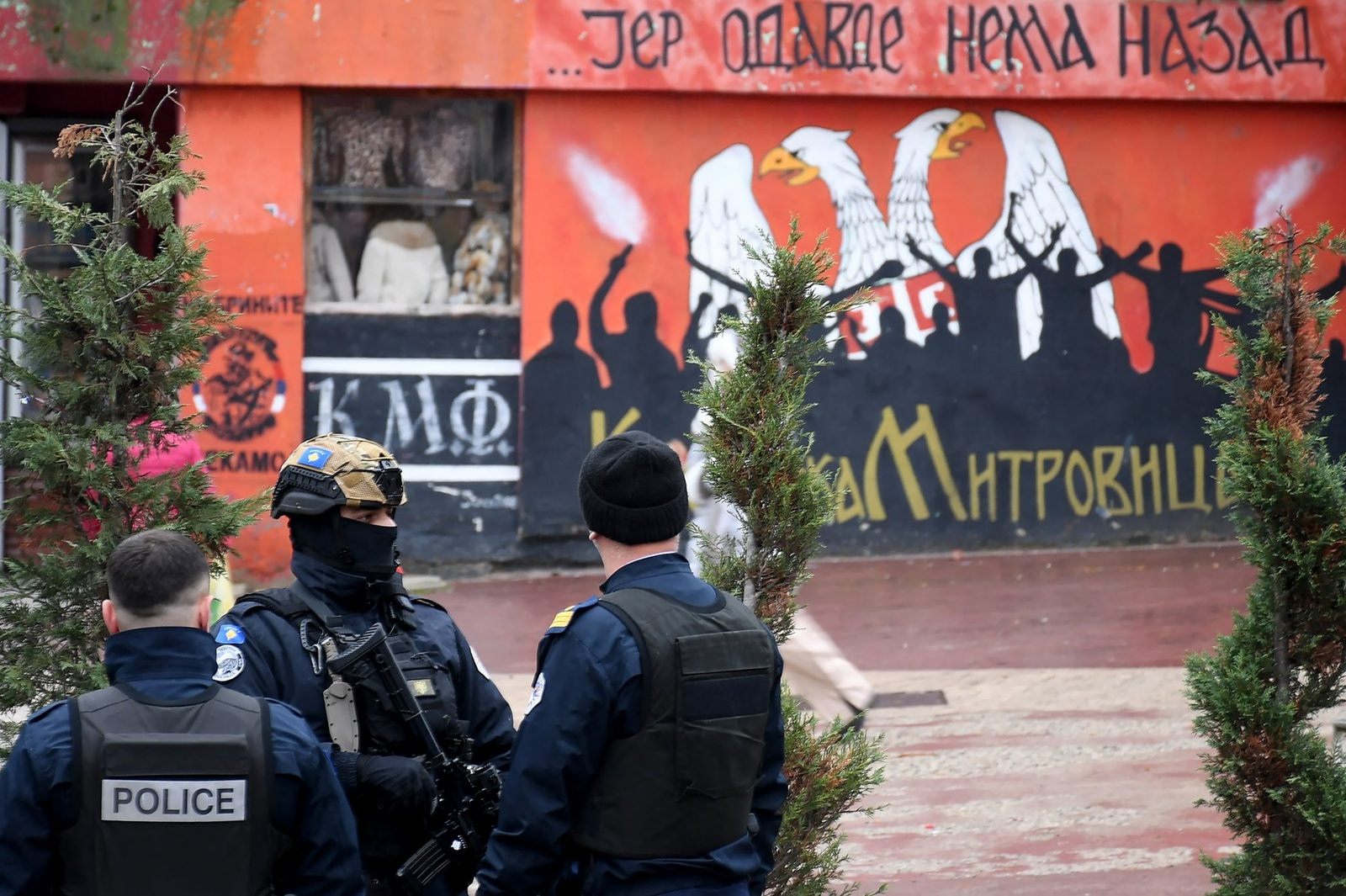 Kosovo Police officers patrol in the streets of Mitrovica, which is ethnically split between Serbs in the north and Albanians in the south, on November 30, 2024, as Kosovo stepped up security measures around "critical" infrastructure and arrested several suspects today after an explosion at a key canal feeding two of its main power plants, as neighbouring Serbia rejected accusations it had staged the blast. The explosion on November 29 near the town of Zubin Potok, which sits in an ethnic Serb-dominated area in Kosovo's troubled north, damaged a canal that supplies water to hundreds of thousands of people and cooling systems at two coal-fired power plants that generate most of Kosovo's electricity.,Image: 941253404, License: Rights-managed, Restrictions: , Model Release: no, Credit line: STRINGER / AFP / Profimedia