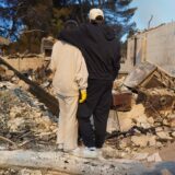 Kyle Kucharski hugs his partner Nicole Perri as they stand on the ruins of their house destroyed by the Palisades Fire in the Pacific Palisades neighborhood of Los Angeles, California on January 10, 2025.  When Kyle Kucharski and Nicole Perri moved into their dream home in the Pacific Palisades area of Los Angeles, they bought a crate of wine to mark the realization of a dream, and put it aside for a special day.
That day never came. 
Now after a raging fire destroyed almost the entire neighborhood, all they have left is the empty box with the brand name written across it: Purgatory.,Image: 952856518, License: Rights-managed, Restrictions: To go with AFP story by Paula RAMON: "'Purgatory: Los Angeles fire leaves nothing but a tiny memento", Model Release: no, Credit line: Cecilia SANCHEZ / AFP / Profimedia