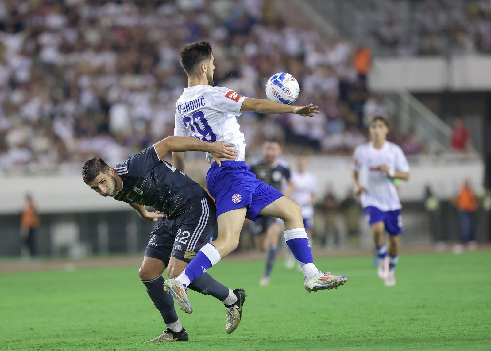 15.08.2024., stadion Poljud, Split - Uzvratna utakmica 3. pretkola kvalifikacija za UEFA Konferencijsku ligu, HNK Hajduk - MFK Ruzomberok. Simon Gabriel, Mate Antunovic Photo: Ivana Ivanovic/PIXSELL