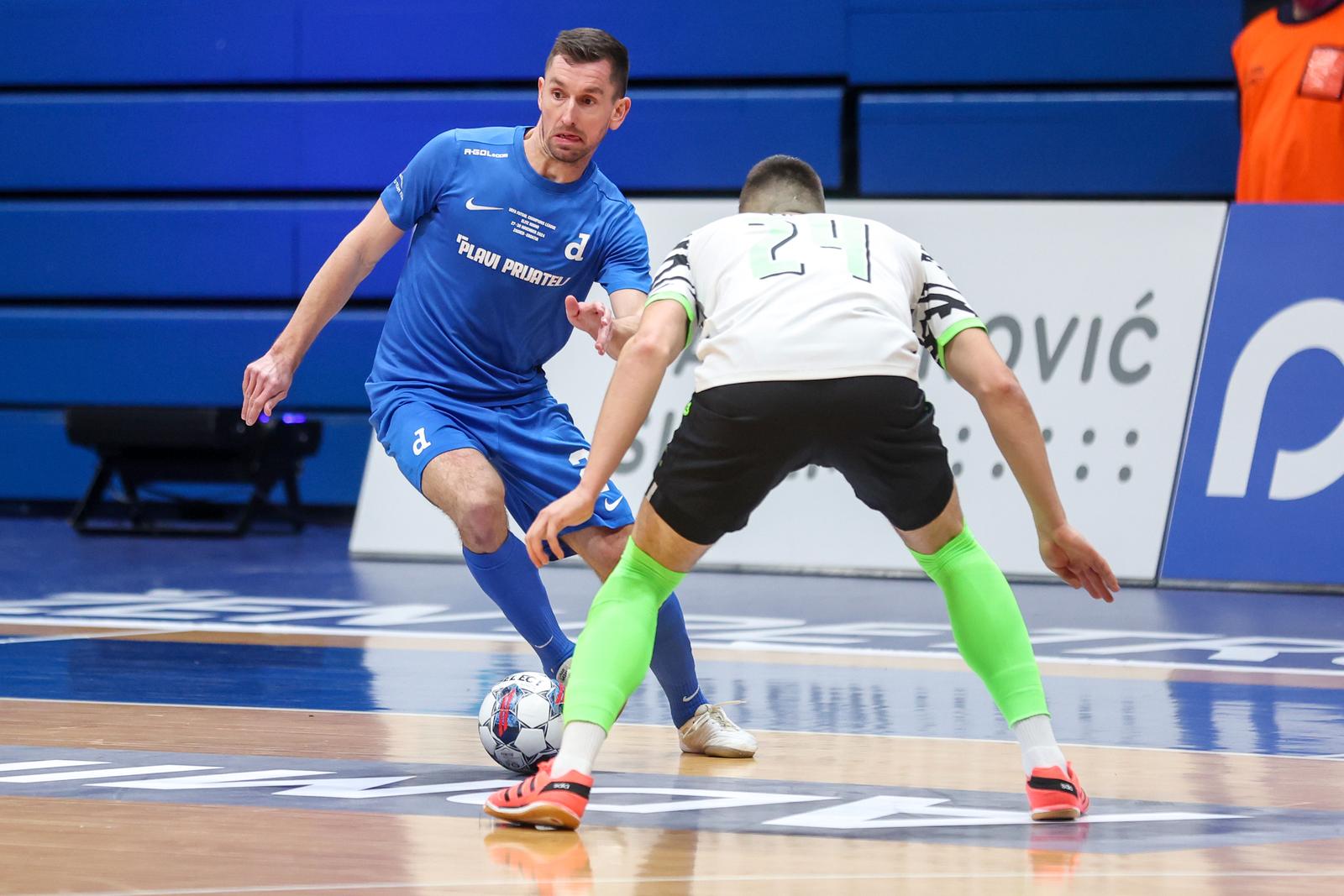 27.11.2024., KC Drazen Petrovic, Zagreb - Elitna runda UEFA Futsal Lige prvaka, skupina B, 1. kolo, MNK Olmissum - MNK Futsal Dinamo. Tihomir Novak, Jure Copic. Photo: Slavko Midzor/PIXSELL