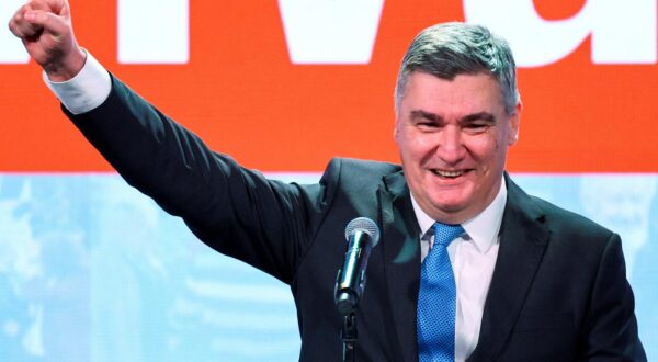 Croatian President and presidential candidate Zoran Milanovic gestures after the first unofficial results of the second round of the presidential election, at Zoran Milanovic's headquarters in Zagreb, Croatia, January 12, 2025. REUTERS/Antonio Bronic Photo: Antonio Bronic/REUTERS