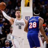 Jan 21, 2025; Denver, Colorado, USA; Denver Nuggets center Nikola Jokic (15) passes the ball against Philadelphia 76ers forward Guerschon Yabusele (28) in the first quarter at Ball Arena. Mandatory Credit: Isaiah J. Downing-Imagn Images Photo: Isaiah J. Downing/REUTERS