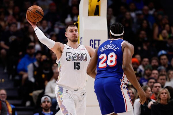 Jan 21, 2025; Denver, Colorado, USA; Denver Nuggets center Nikola Jokic (15) passes the ball against Philadelphia 76ers forward Guerschon Yabusele (28) in the first quarter at Ball Arena. Mandatory Credit: Isaiah J. Downing-Imagn Images Photo: Isaiah J. Downing/REUTERS