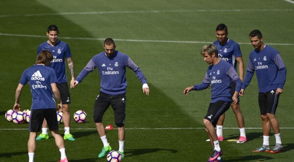 (From L) Real Madrid's Croatian midfielder Luka Modric, Real Madrid's Colombian midfielder James Rodriguez, Real Madrid's French forward Karim Benzema, Real Madrid's Portuguese defender Fabio Coentrao, Real Madrid's Brazilian midfielder Casemiro and Real Madrid's Portuguese forward Cristiano Ronaldo attend a training session at Valdebebas training grounds in Madrid on April 14, 2017 on the eve of their Liga football match against Sporting Gijon.,Image: 329006815, License: Rights-managed, Restrictions: , Model Release: no, Credit line: PIERRE-PHILIPPE MARCOU / AFP / Profimedia