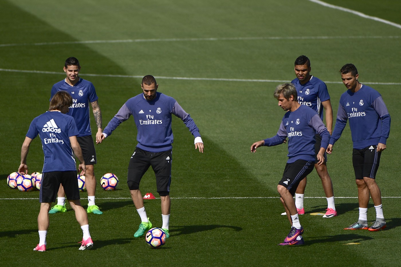 (From L) Real Madrid's Croatian midfielder Luka Modric, Real Madrid's Colombian midfielder James Rodriguez, Real Madrid's French forward Karim Benzema, Real Madrid's Portuguese defender Fabio Coentrao, Real Madrid's Brazilian midfielder Casemiro and Real Madrid's Portuguese forward Cristiano Ronaldo attend a training session at Valdebebas training grounds in Madrid on April 14, 2017 on the eve of their Liga football match against Sporting Gijon.,Image: 329006815, License: Rights-managed, Restrictions: , Model Release: no, Credit line: PIERRE-PHILIPPE MARCOU / AFP / Profimedia