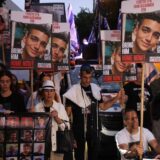 Relatives and supporters of Israeli hostages taken by Palestinian militants on the October 7 Hamas attack and held in Gaza, hold images of their loved ones during a protest calling for their release in front of Prime Minister Benjamin Netanyahu residency in Jerusalem on October 7, 2024.,Image: 917496529, License: Rights-managed, Restrictions: , Model Release: no, Credit line: Menahem KAHANA / AFP / Profimedia