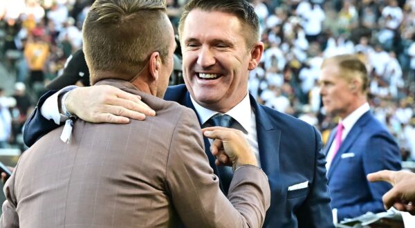 Former Republic of Ireland and LA Galaxy player Robbie Keane (R) meets with former US National team's Taylor Twellman before the trophy presentation following the Major League Soccer (MLS) Cup Final match between the LA Galaxy and the NY Red Bulls at the Dignity Health Sports Park in Carson, California, on December 7, 2024.,Image: 944203123, License: Rights-managed, Restrictions: , Model Release: no, Credit line: Frederic J. BROWN / AFP / Profimedia