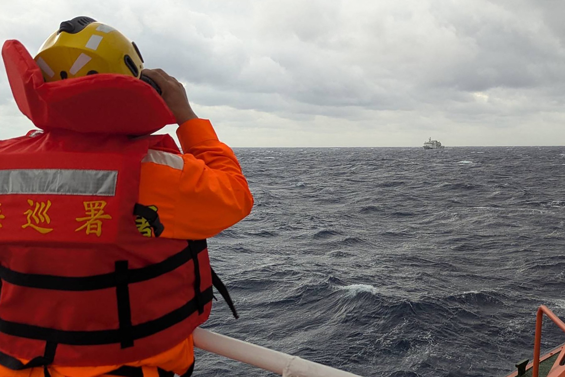 This handout photograph taken between December 7-8, 2024 and released on December 9 by the Taiwan Coast Guard shows a crewmember on board a Taiwan Coast Guard ship monitoring a Chinese coast guard vessel in waters east of Taiwan.  Taiwan's coast guard said December 9 it had detected "unusual movements" of seven Chinese coast guard ships since the early hours of December 6 -- the day Taiwan President Lai Ching-te returned to Taipei following a Pacific tour last week that included two stopovers on US soil. There was no immediate public announcement by the PLA or Chinese state media about increased military activity around Taiwan.,Image: 944636608, License: Rights-managed, Restrictions: RESTRICTED TO EDITORIAL USE - MANDATORY CREDIT "AFP PHOTO / TAIWAN COAST GUARD" - NO MARKETING NO ADVERTISING CAMPAIGNS - DISTRIBUTED AS A SERVICE TO CLIENTS, ***
HANDOUT image or SOCIAL MEDIA IMAGE or FILMSTILL for EDITORIAL USE ONLY! * Please note: Fees charged by Profimedia are for the Profimedia's services only, and do not, nor are they intended to, convey to the user any ownership of Copyright or License in the material. Profimedia does not claim any ownership including but not limited to Copyright or License in the attached material. By publishing this material you (the user) expressly agree to indemnify and to hold Profimedia and its directors, shareholders and employees harmless from any loss, claims, damages, demands, expenses (including legal fees), or any causes of action or allegation against Profimedia arising out of or connected in any way with publication of the material. Profimedia does not claim any copyright or license in the attached materials. Any downloading fees charged by Profimedia are for Profimedia's services only. * Handling Fee Only 
***, Model Release: no, Credit line: Handout / AFP / Profimedia