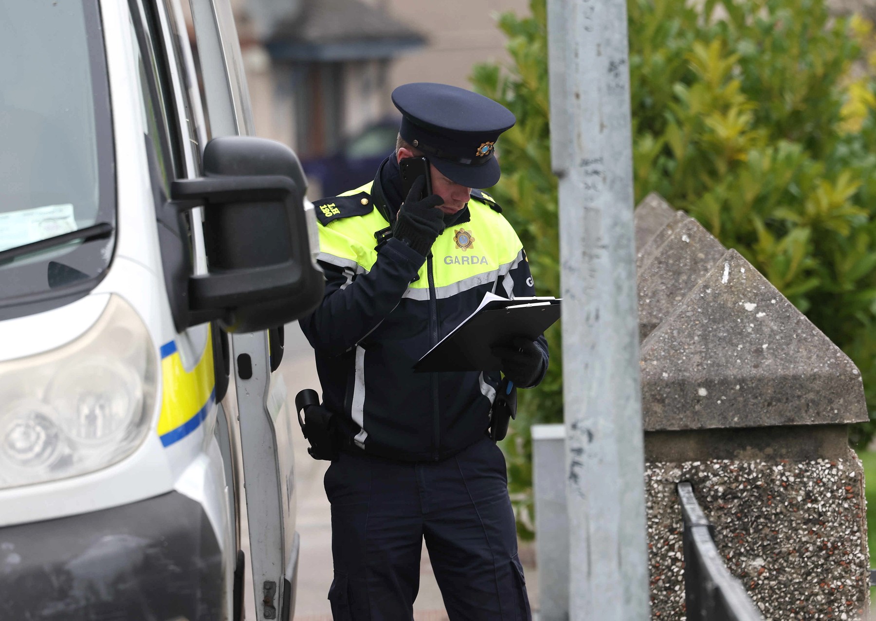 A Garda officer stands near a property on Beechwood Drive in Drogheda, where police are carrying out a forensic search in relation to the disappearance of Kyran Durnin, from Co Louth. A man is being detained on suspicion of the murder of the Irish schoolboy. Officers launched searches at two houses in Drogheda on Thursday with the aim of discovering any evidence which may reveal where Kyran is or what happened to him. Picture date: Thursday December 12, 2024.,Image: 945897953, License: Rights-managed, Restrictions: , Model Release: no, Credit line: Damien Eagers / PA Images / Profimedia