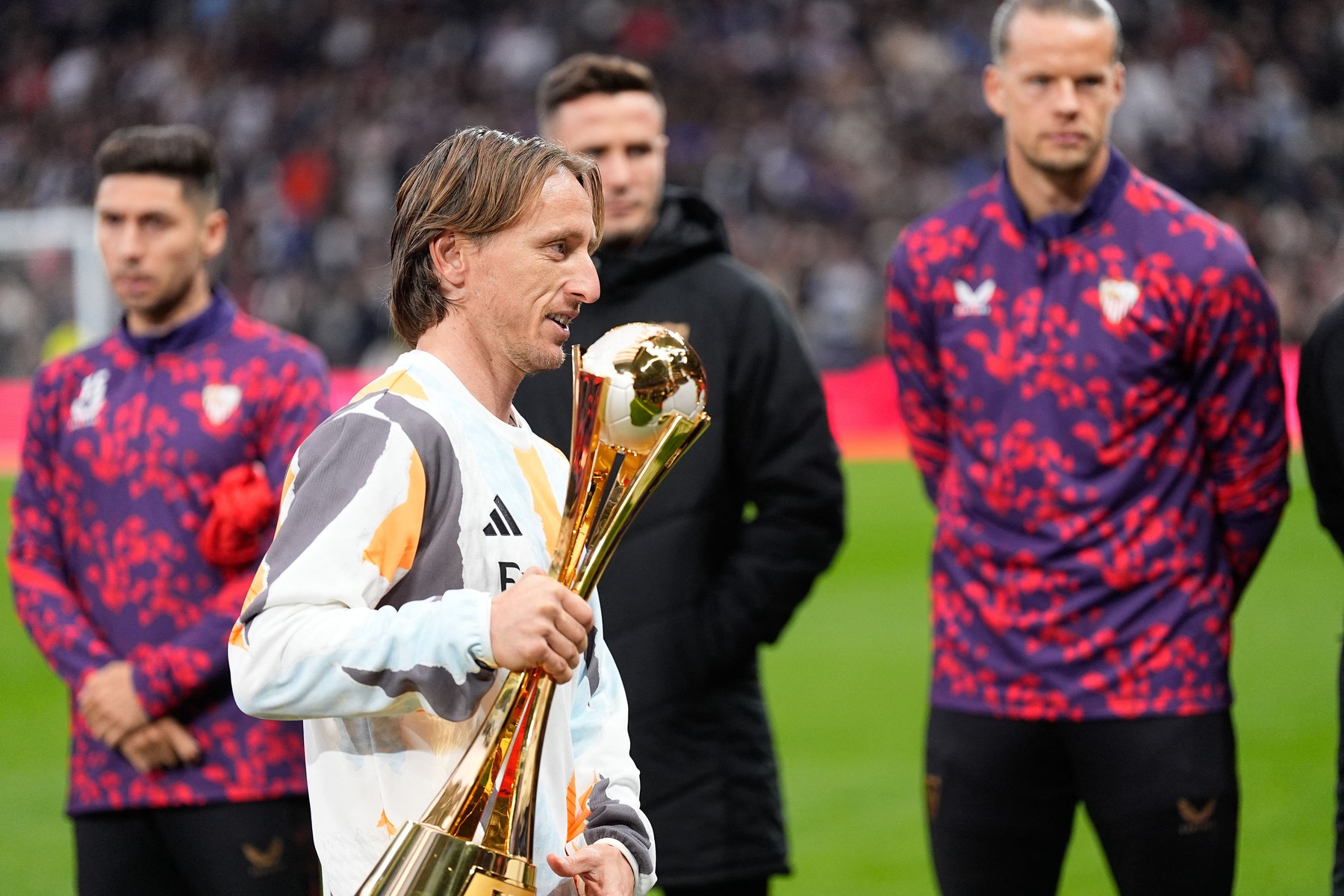 Luka Modric of Real Madrid shows the Intercontinental Champions Trophy to the supporters during the Spanish championship La Liga football match between Real Madrid CF and Sevilla FC on 22 December 2024 at Santiago Bernabeu stadium in Madrid, Spain - Photo Oscar J Barroso / Spain DPPI / DPPI,Image: 949520777, License: Rights-managed, Restrictions: Hungary Out, Model Release: no, Credit line: Oscar Barroso / AFP / Profimedia