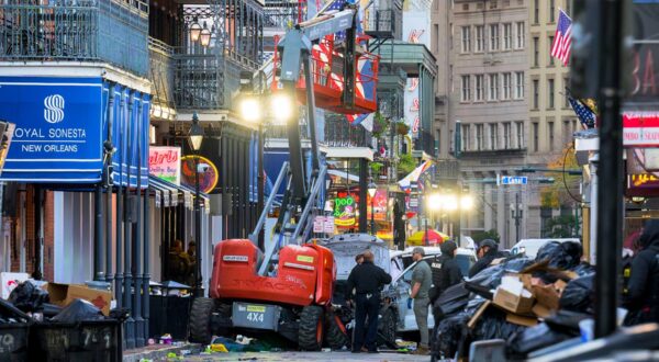 Police investigators surround a white truck that has been crashed into a work lift in the French Quarter of New Orleans, Louisiana, on January 1, 2025. At least 10 people were killed and 30 injured Wednesday when a vehicle plowed overnight into a New year's crowd in the heart of the thriving New Orleans tourist district, authorities in the southern US city said.,Image: 951223584, License: Rights-managed, Restrictions: , Model Release: no, Credit line: Matthew HINTON / AFP / Profimedia